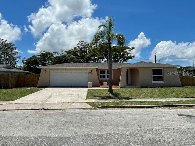 3447 Woodcock Drive Holiday FL 34690 W7865973 image1