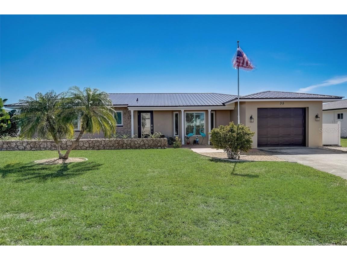 35 Caddy Road Rotonda West FL 33947 - OAKLAND HILLS CREEK A4600943 image1