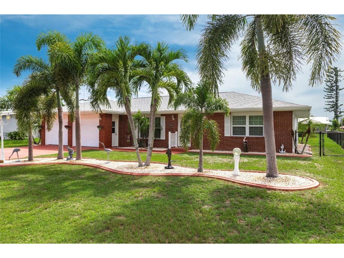 402 Ferris Drive NW Port Charlotte FL 33952 C7494698 image1