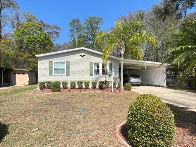 407 Sandalwood Lane Wildwood FL 34785 - LAKE OKAHUMPKA G5065984 image1
