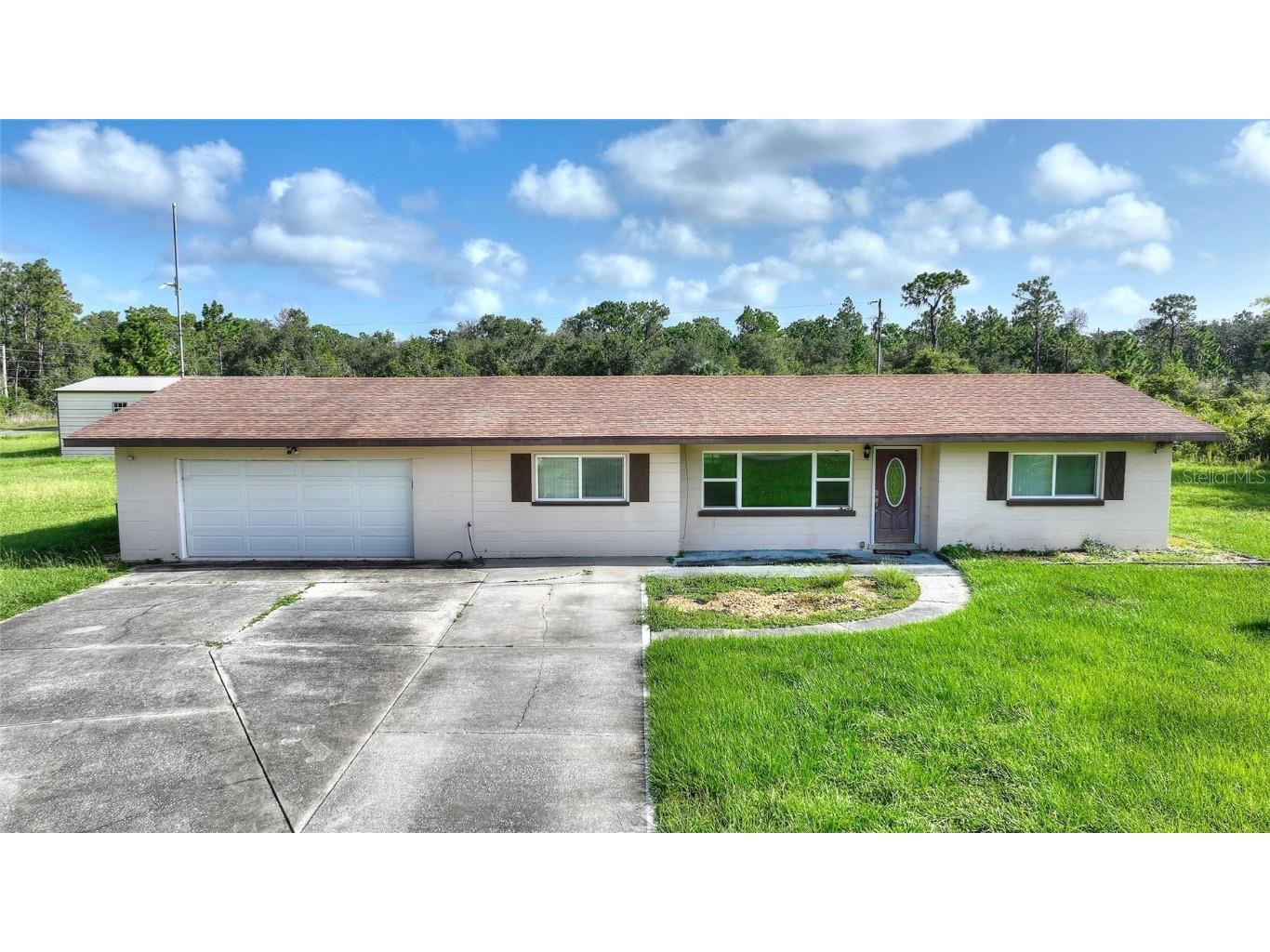 4450 Camellia Drive Indian Lake Estates FL 33855 - LAKE WALK IN WATER TB8405126 image1