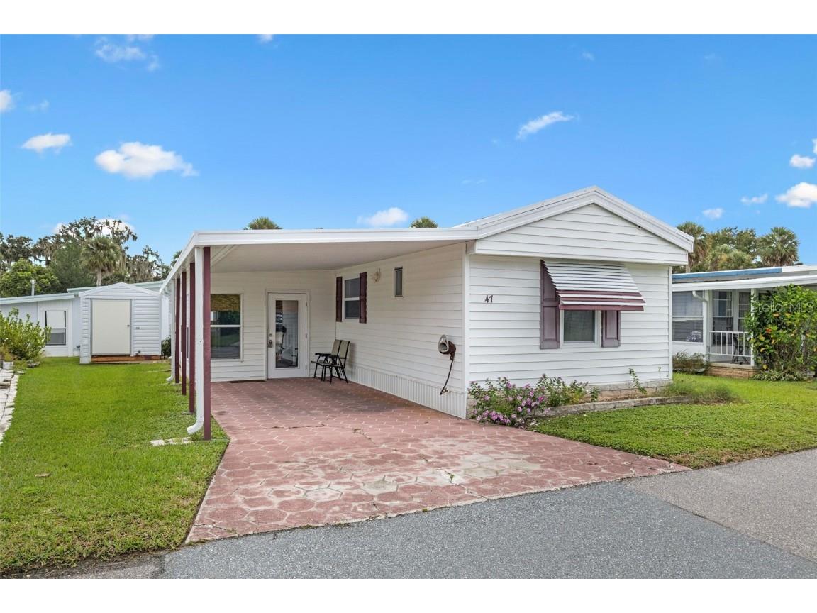 47 Cocos Plumosa Drive Eustis FL 32726 - Trout Lake O6342634 image1