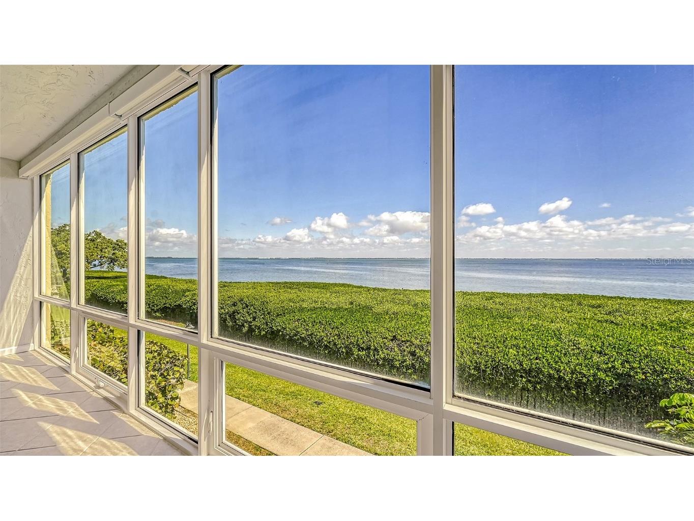 4900 Gulf Of Mexico Drive #203B Longboat Key FL 34228 - SARASOTA BAY A4561732 image1