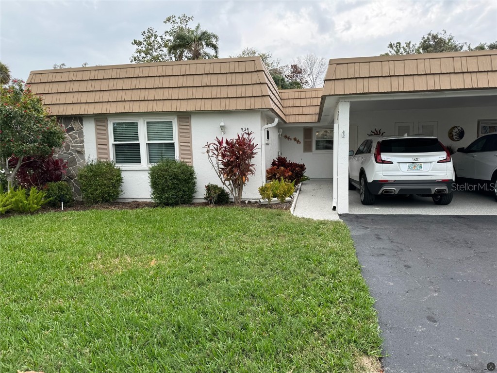 5477 Riverbluff Circle #34 Sarasota FL 34231 - Canal A4595098 image1