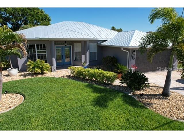 557 Boundary Boulevard Rotonda West FL 33947 - BUTTERFORD WATERWAY D6124560 image1
