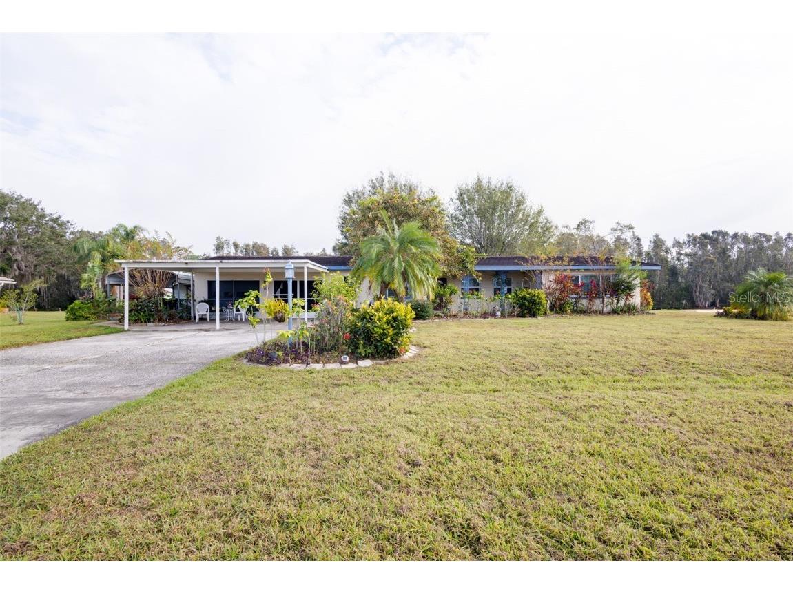 6085 Amaryllis Drive Indian Lake Estates FL 33855 - LAKE WALK IN WATER TB8332916 image1