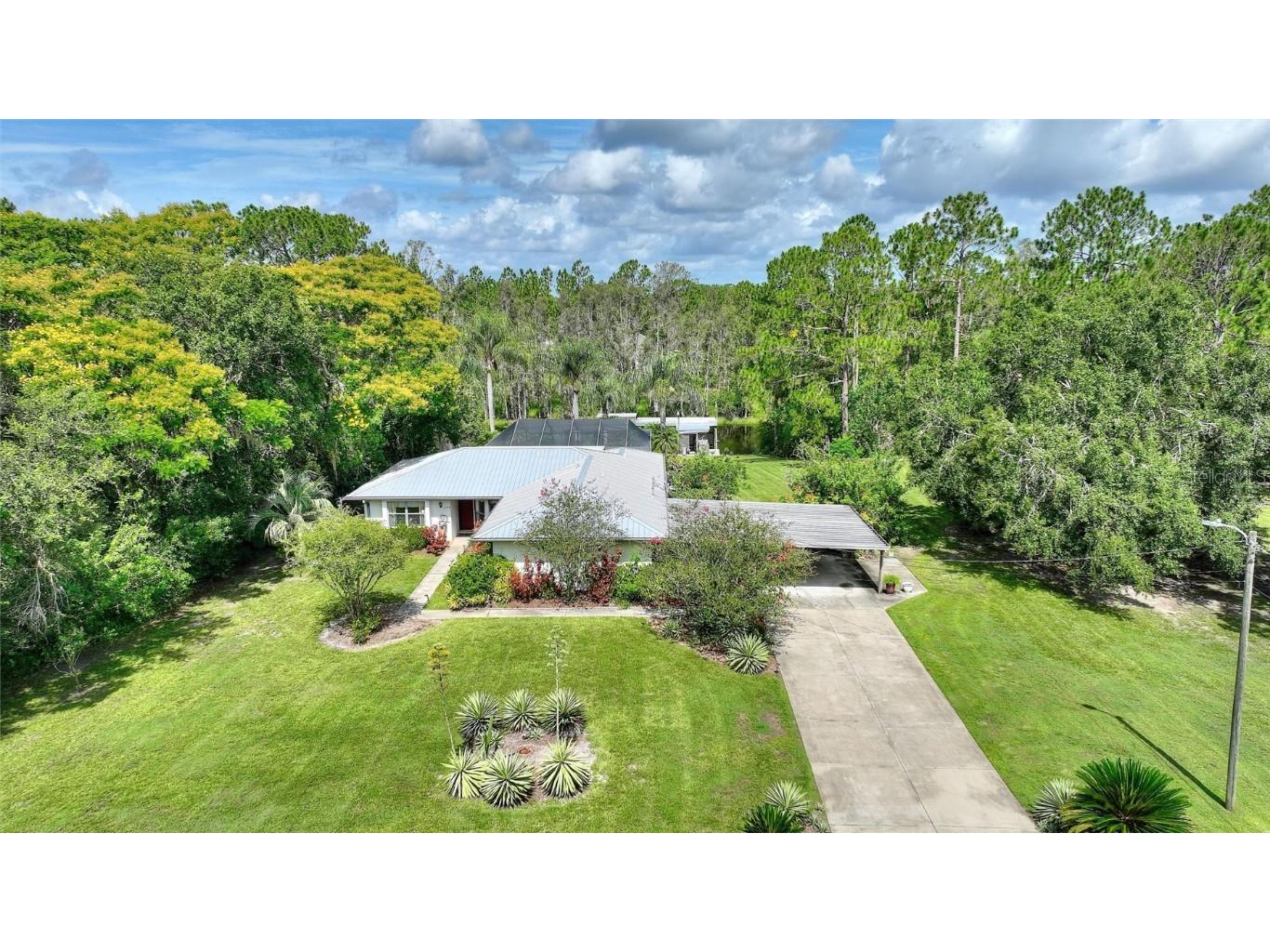 6168 Arborea Drive Indian Lake Estates FL 33855 - LAKE WALK IN WATER TB8403423 image1