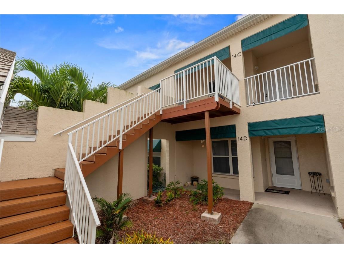 6330 99th Way N #14C Saint Petersburg FL 33708 - Retention pond TB8434357 image1