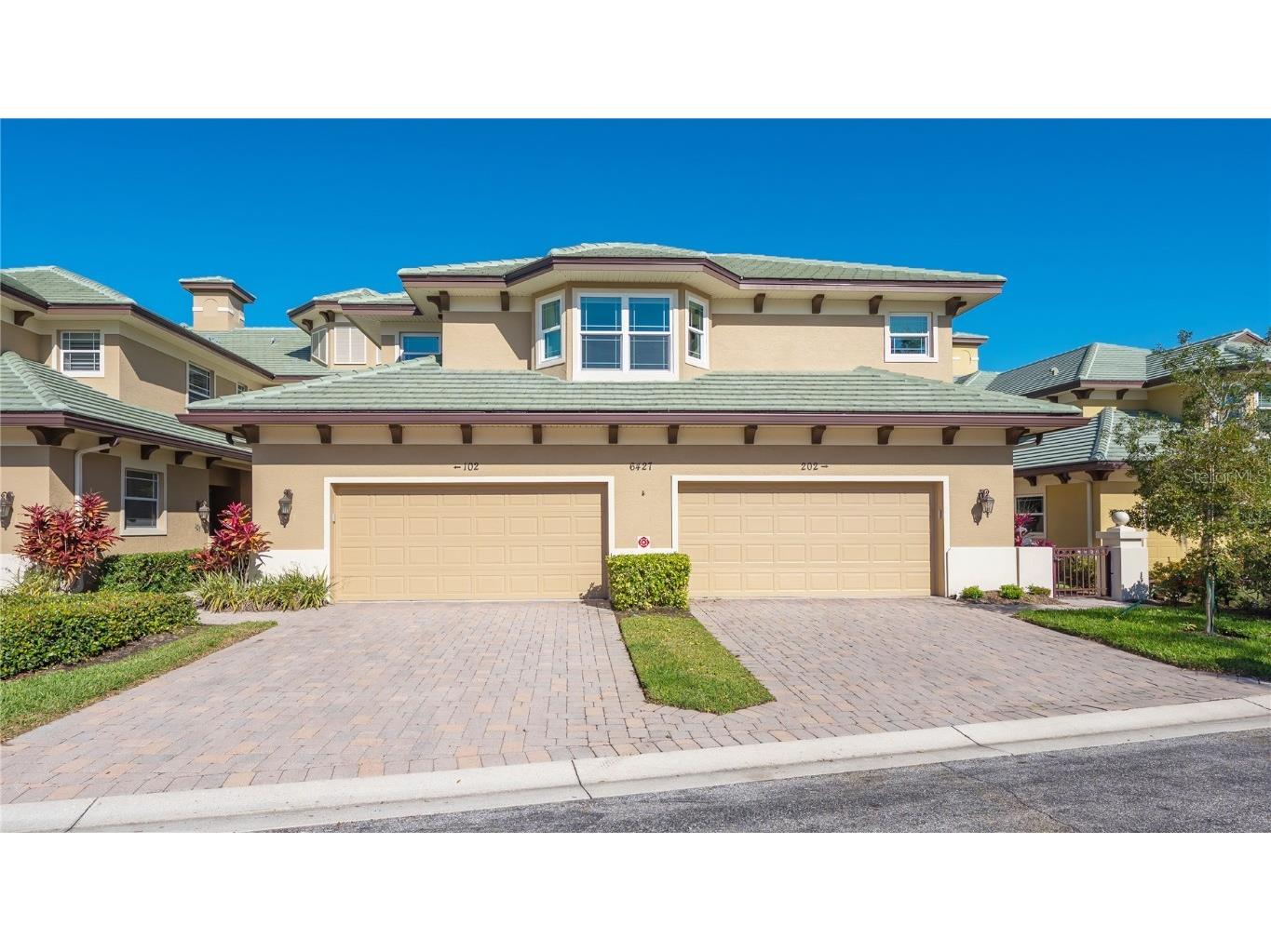 6427 Moorings Point Circle #102 Lakewood Ranch FL 34202 - LAKE ULHLEIN A4601132 image1