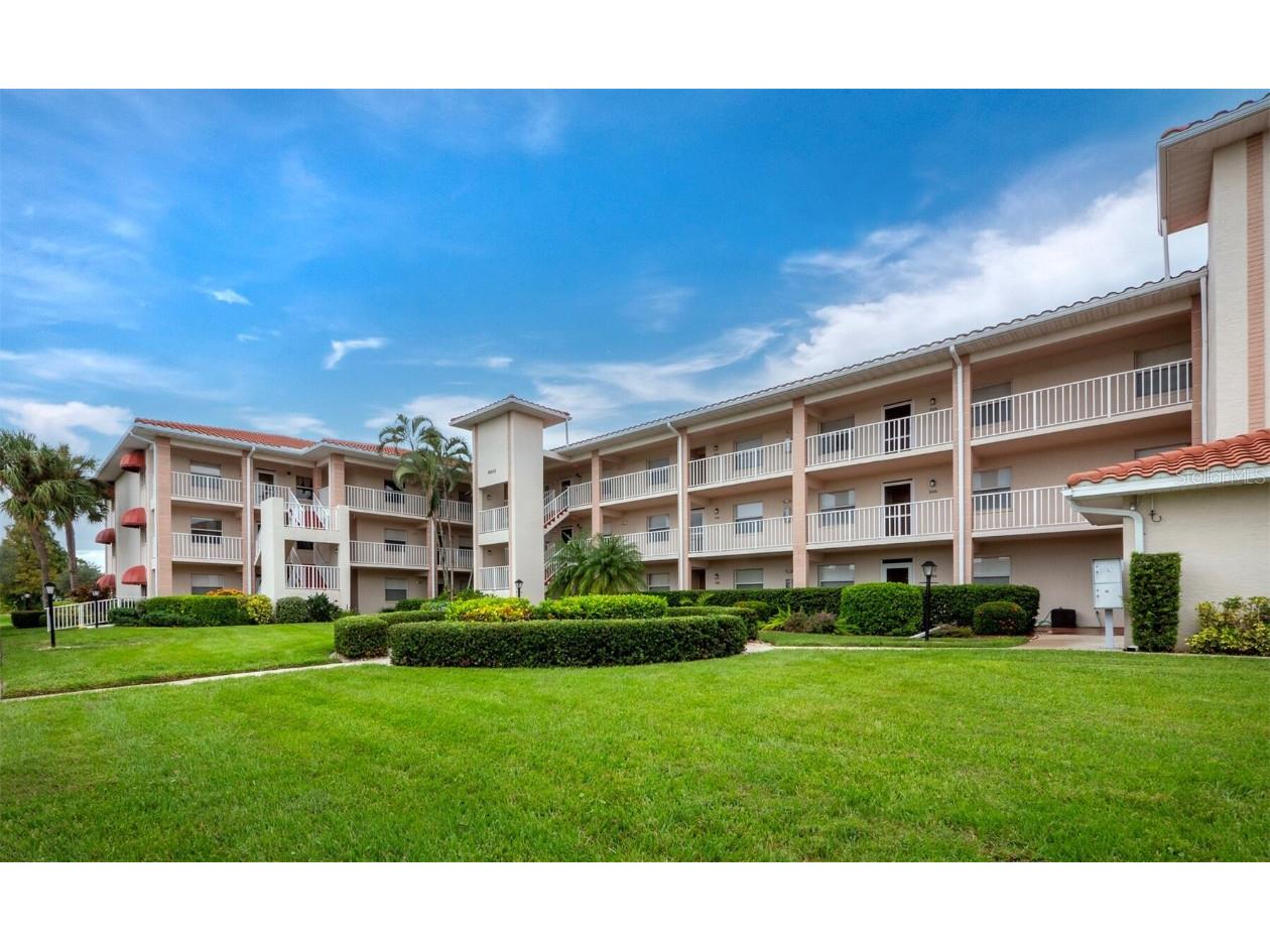 6505 Stone River Road #302 Bradenton FL 34203 - LAKE ON TARA GOLF COURSE A4585507 image1