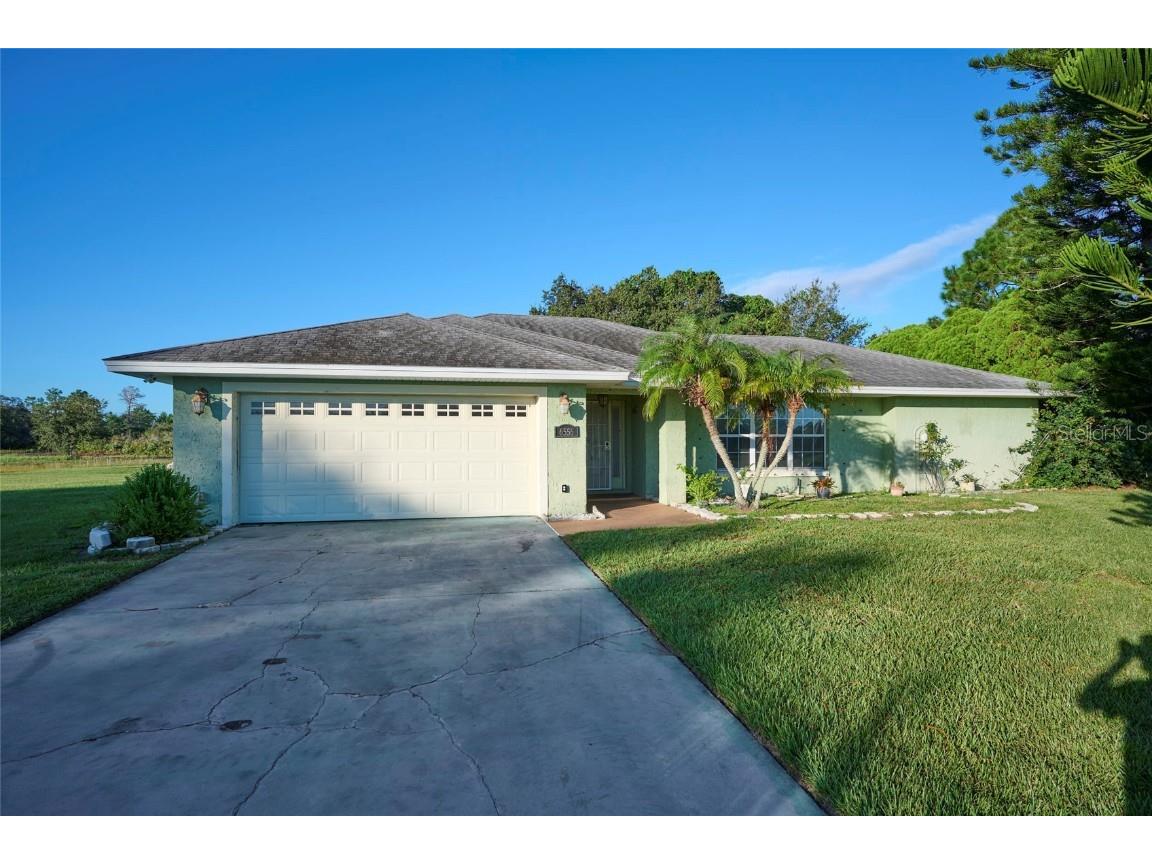 6556 Red Grange Boulevard Indian Lake Estates FL 33855 - LAKE WALK IN WATER TB8306996 image1