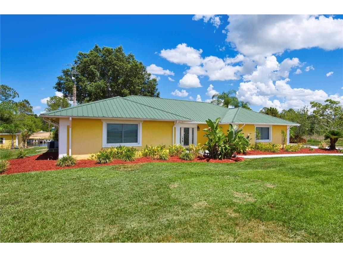 6589 Banyan Drive Indian Lake Estates FL 33855 - LAKE WALK IN WATER TB8370890 image1