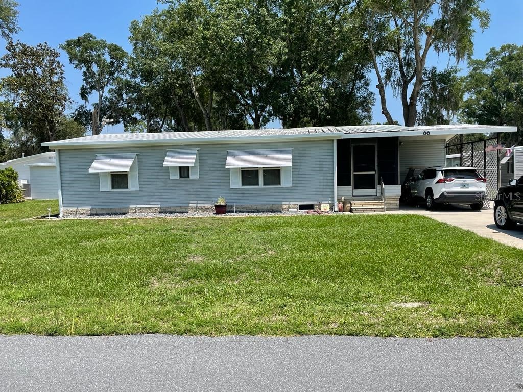 66 Robin Road Wildwood FL 34785 - LAKE OKAHUMPKA P4926097 image1