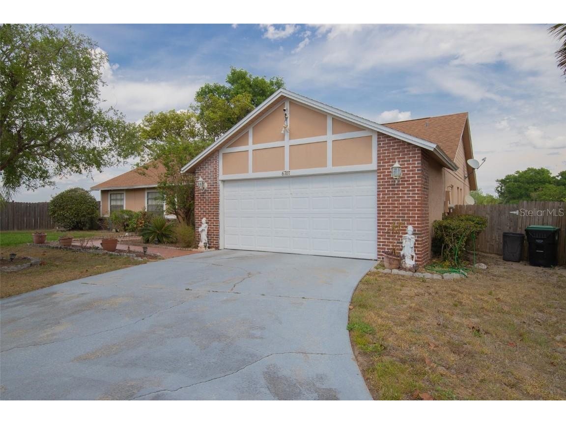 6707 NW Merlin Court Orlando FL 32810 O6099268 image1