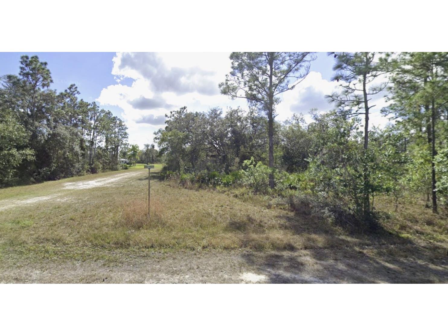 701 Orchid Drive Indian Lake Estates FL 33855 - LAKE WALK-IN-WATER TB8394011 image1