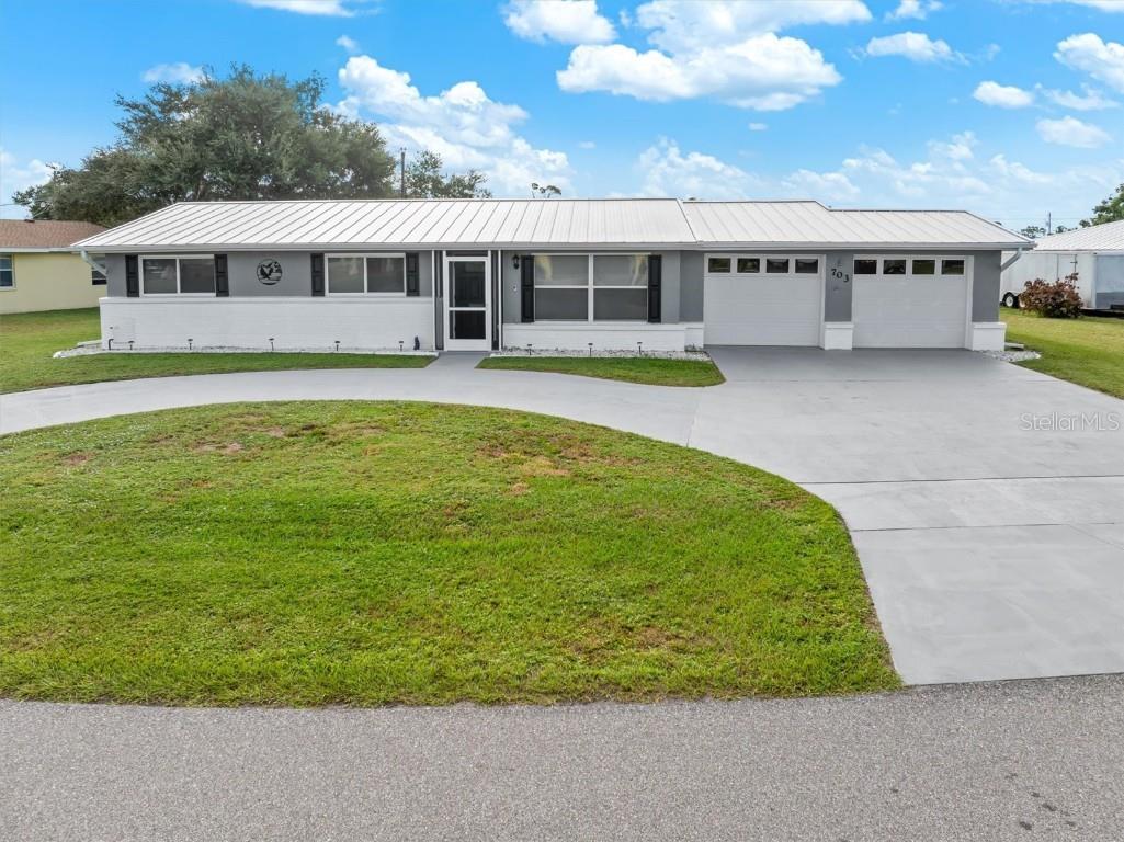 703 Spring Lake Boulevard NW Port Charlotte FL 33952 C7515906 image1