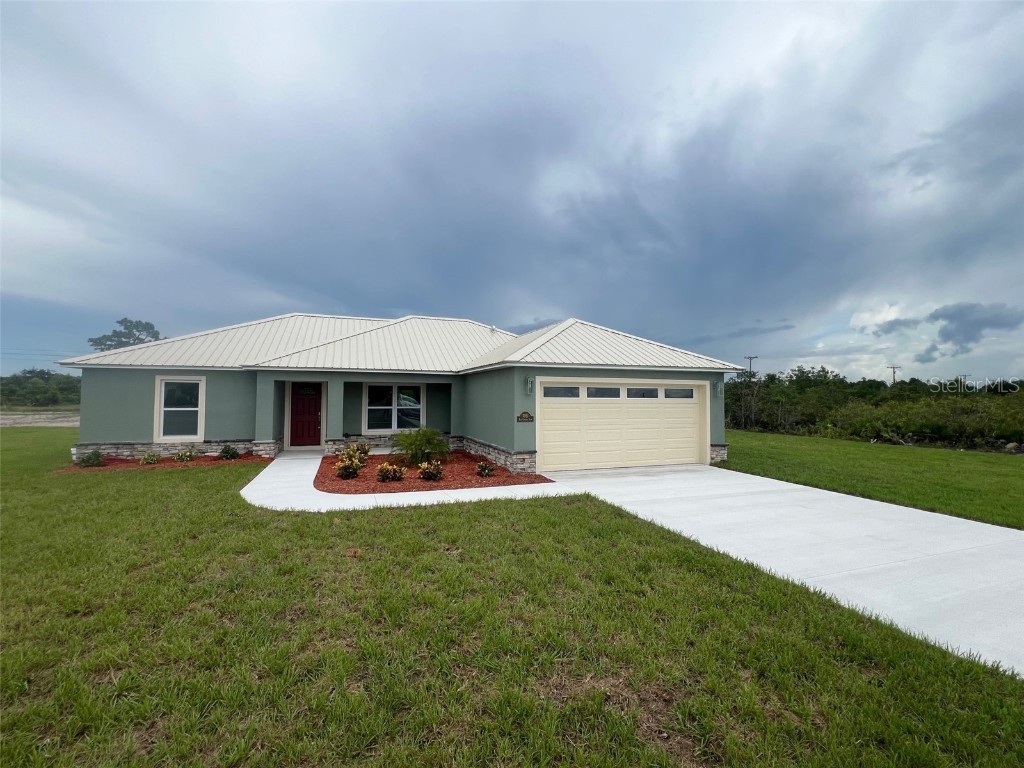 7051 Red Grange Boulevard Indian Lake Estates FL 33855 - LAKE WALK IN WATER T3522160 image1