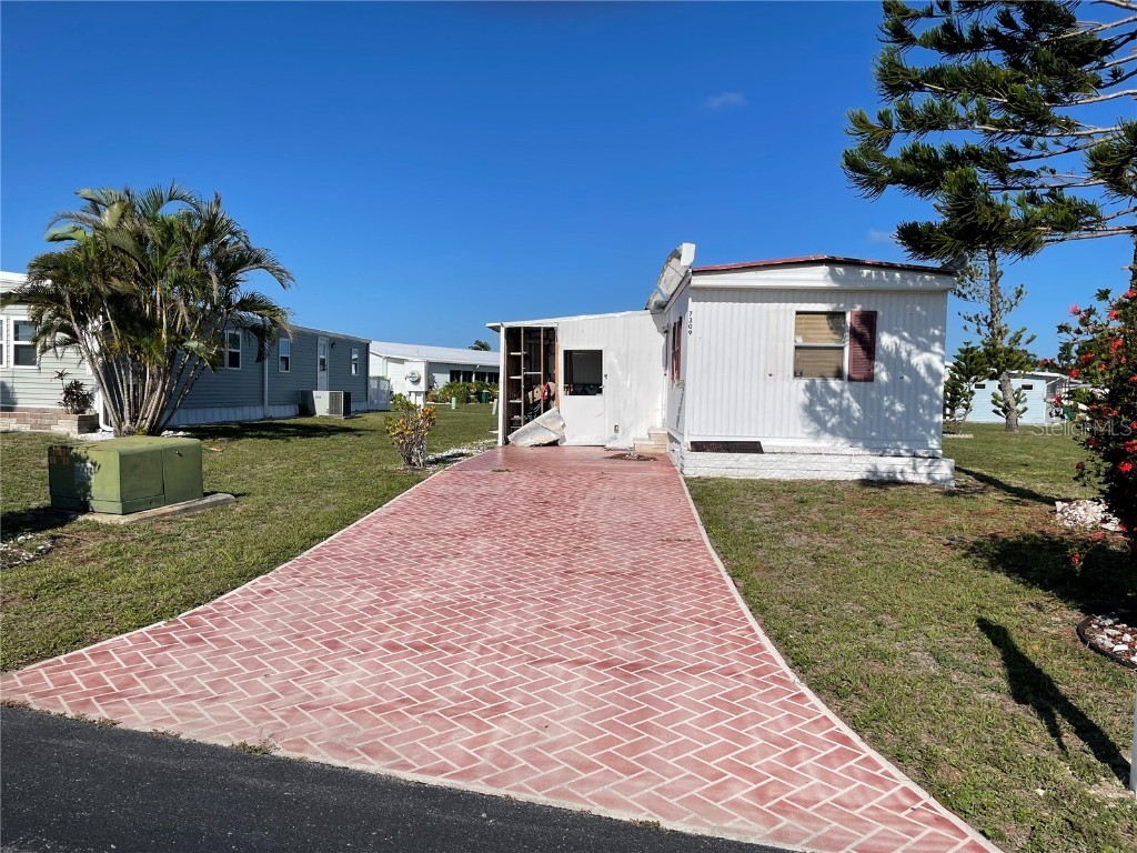 7309 Adana Avenue Port Charlotte FL 33981 - BUTTERFORD WATERWAY D6130811 image1