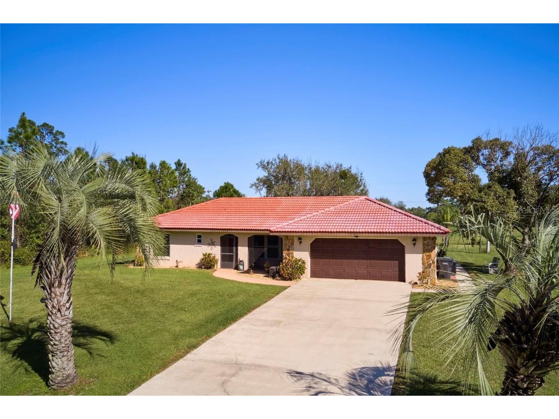 7651 Limonia Drive Indian Lake Estates FL 33855 - LAKE WALK IN WATER T3427331 image1
