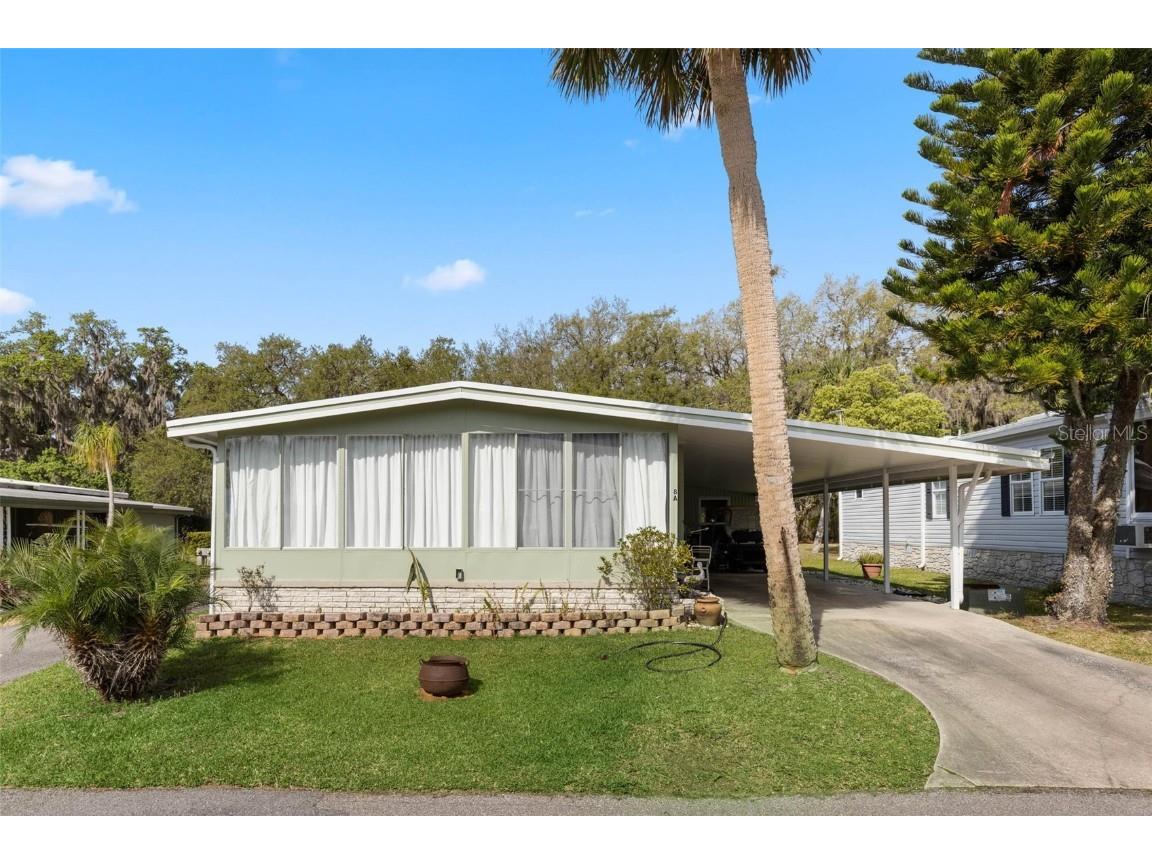 8 Cocos Plumosa Drive #A Eustis FL 32726 - Trout Lake O6366279 image1