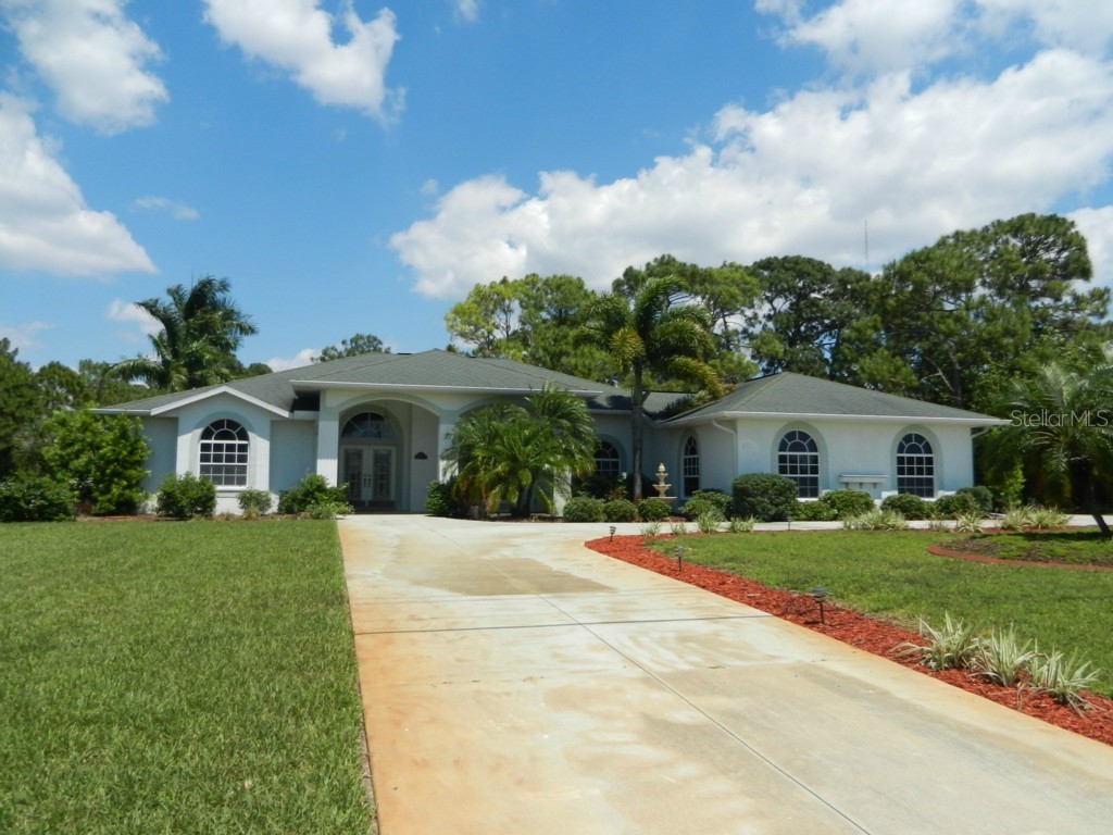 819 Boundary Boulevard Rotonda West FL 33947 D5905379 image1