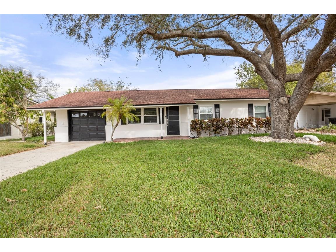 8611 Driftwood Drive Tampa FL 33615 - SALTWATER CANAL TO TAMPA BAY TB8353328 image1