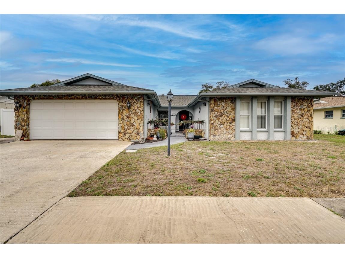 8731 Woodmont Lane Port Richey FL 34668 W7854326 image1