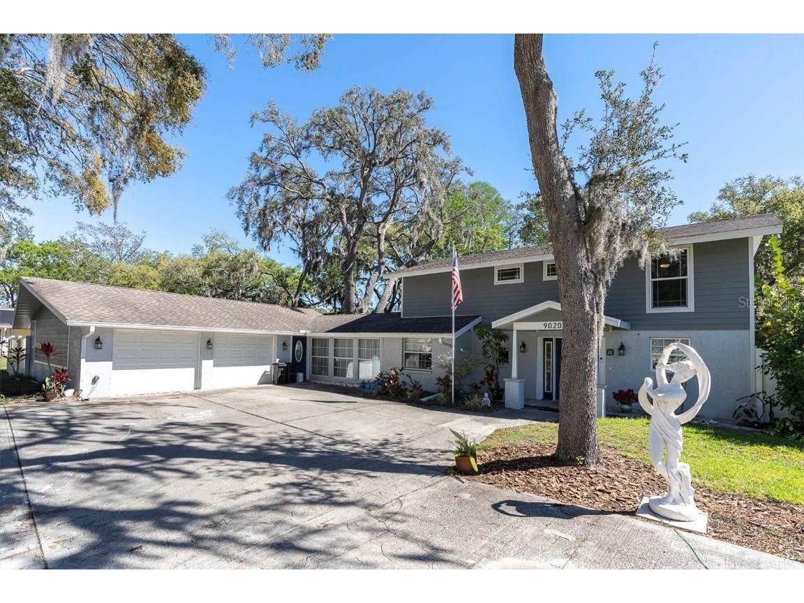 9020 Sharon Drive New Port Richey FL 34654 - BLUE BONNET LAKE W7873443 image1