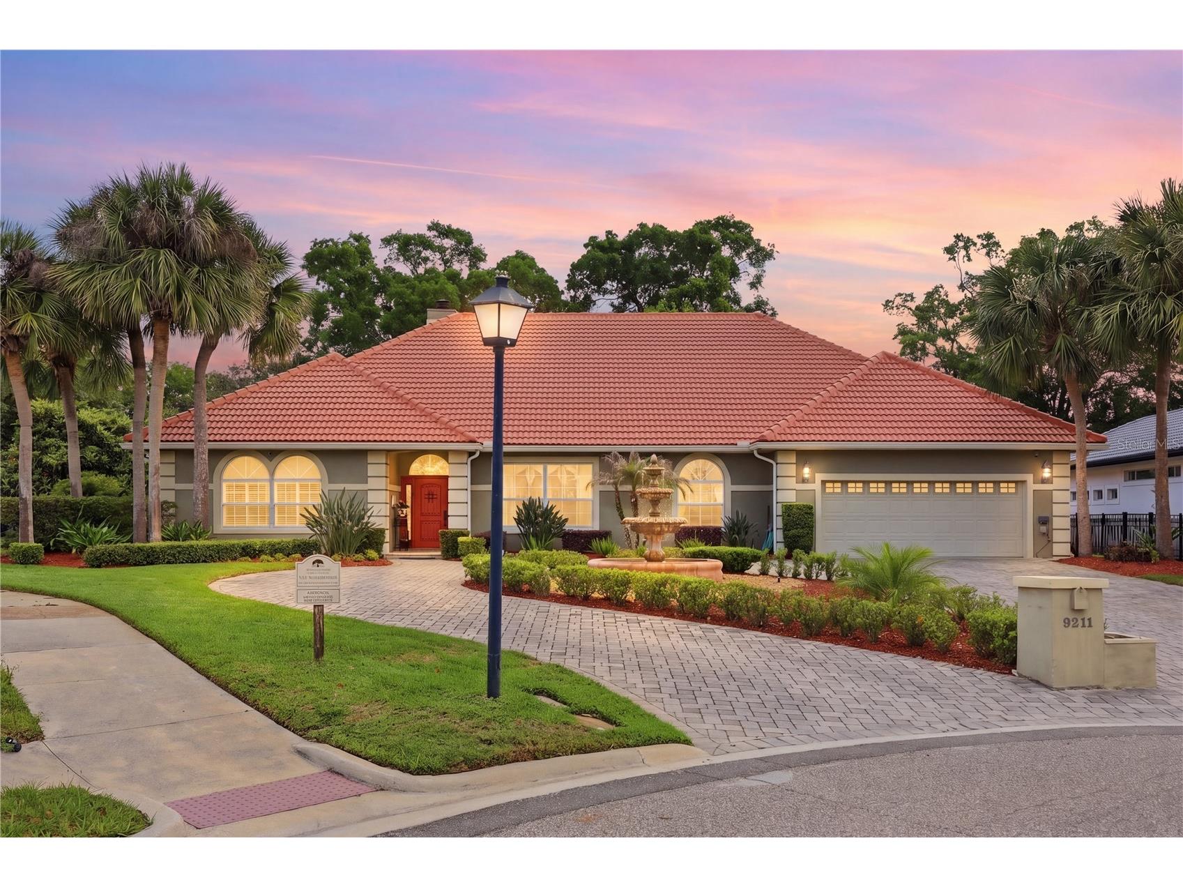 9211 Hidden Bay Lane Orlando FL 32819 - LAKE TIBET O6396887 image1