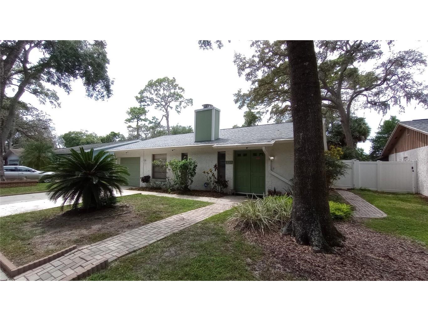 9702 Hidden Oaks Circle Tampa FL 33612 T3473289 image1