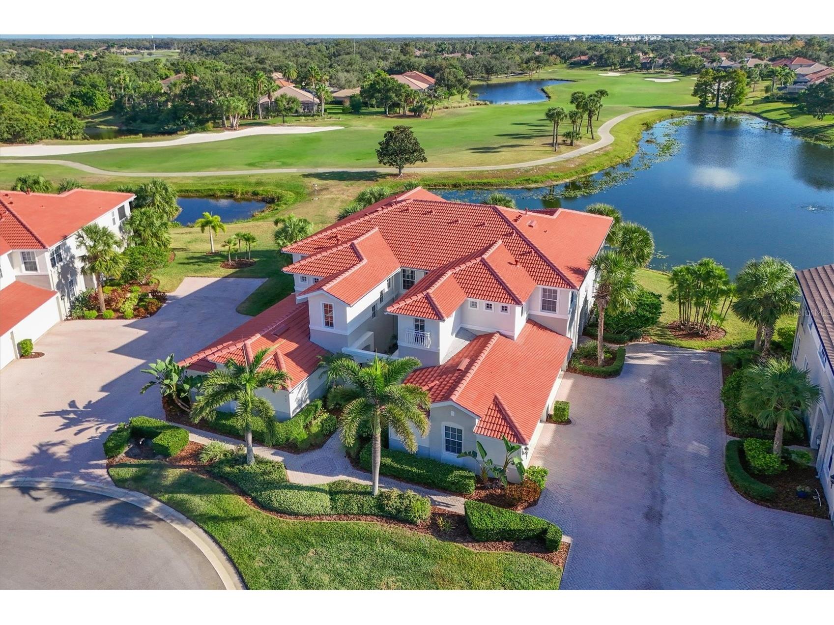 9712 Sea Turtle Terrace #201 Bradenton FL 34212 - 1ST HOLE GOLF COURSE POND A4680932 image1