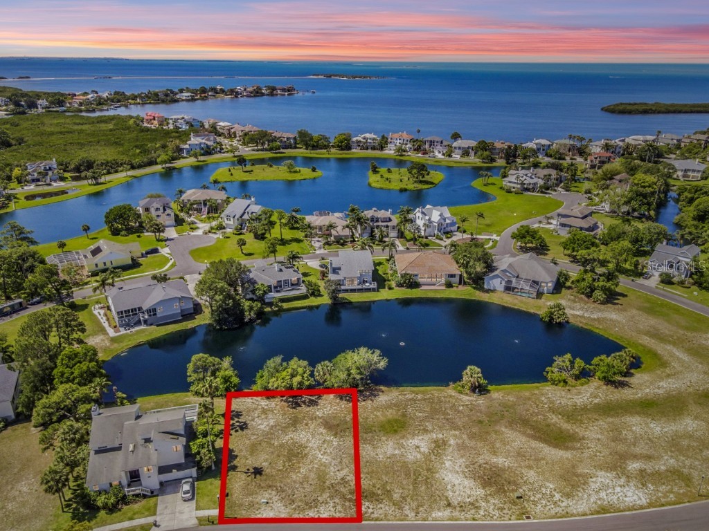 Lot 33 N Pointe Alexis Drive Tarpon Springs FL 34689 - POND U8158693 image1