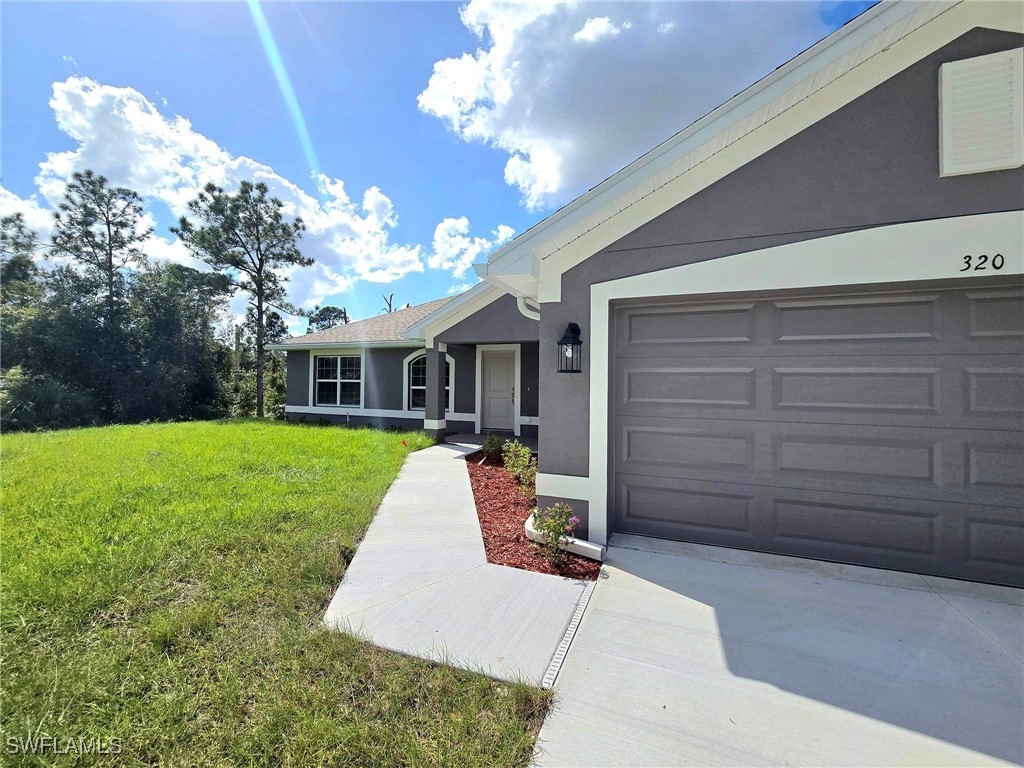320 Malaga Avenue S Lehigh Acres FL 33974 224045942 image2